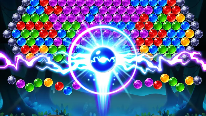 Skjermbilde fra Bubble Shooter Genies med en boble på vei opp mot en klynge av fargede bobler